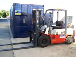 AGB 's forklift is patiently waiting to do the heavy lifting of Storage Crates or any pallets of goods