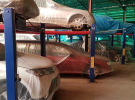 Many cars are stored inside to keep them safe from inclement weather