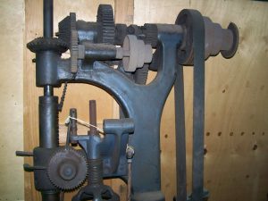 A large industrial drill press is one of the many different things that can be stored until required